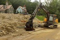 Ludlow VT Route 100 cleanup excavator and homes