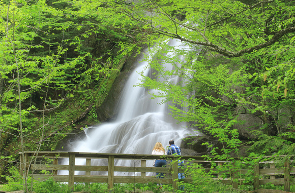 Moss Glen Falls and tourists in spring