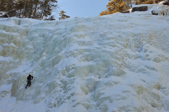 Arethusa Falls frozen with ice climber